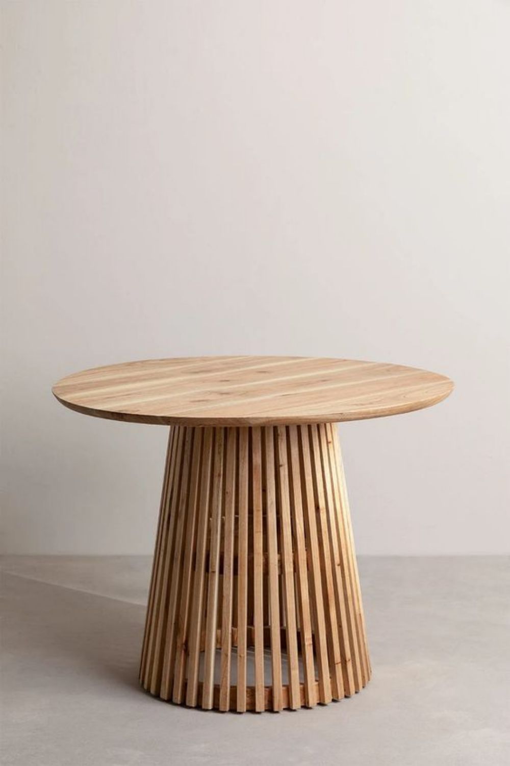 Round solid wood dining table